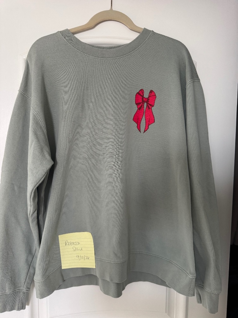 Living Fully bow sweatshirt with Christmas tree on the back